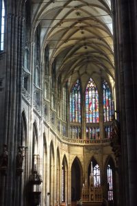 Light pouring in through St. Vistus's Czech glass windows.