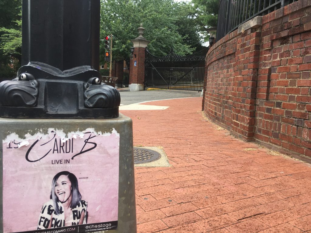 Not all signage is historical. Cardi B album promo poster on a vintage lamp post