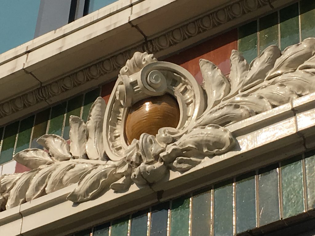 Plaster details outside a Hyde Park retail building