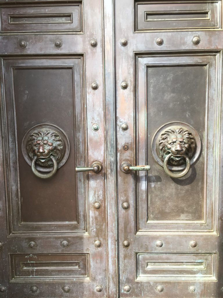 Impressive doors guarding the monument entry