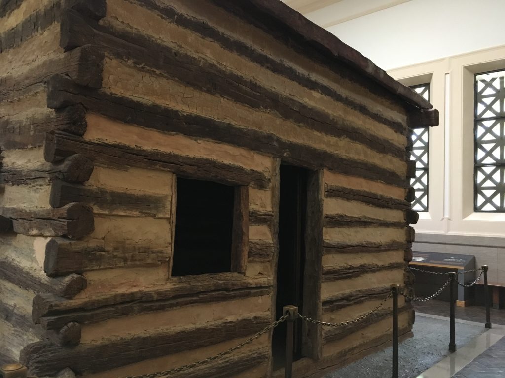 Period log cabin inside the monument 